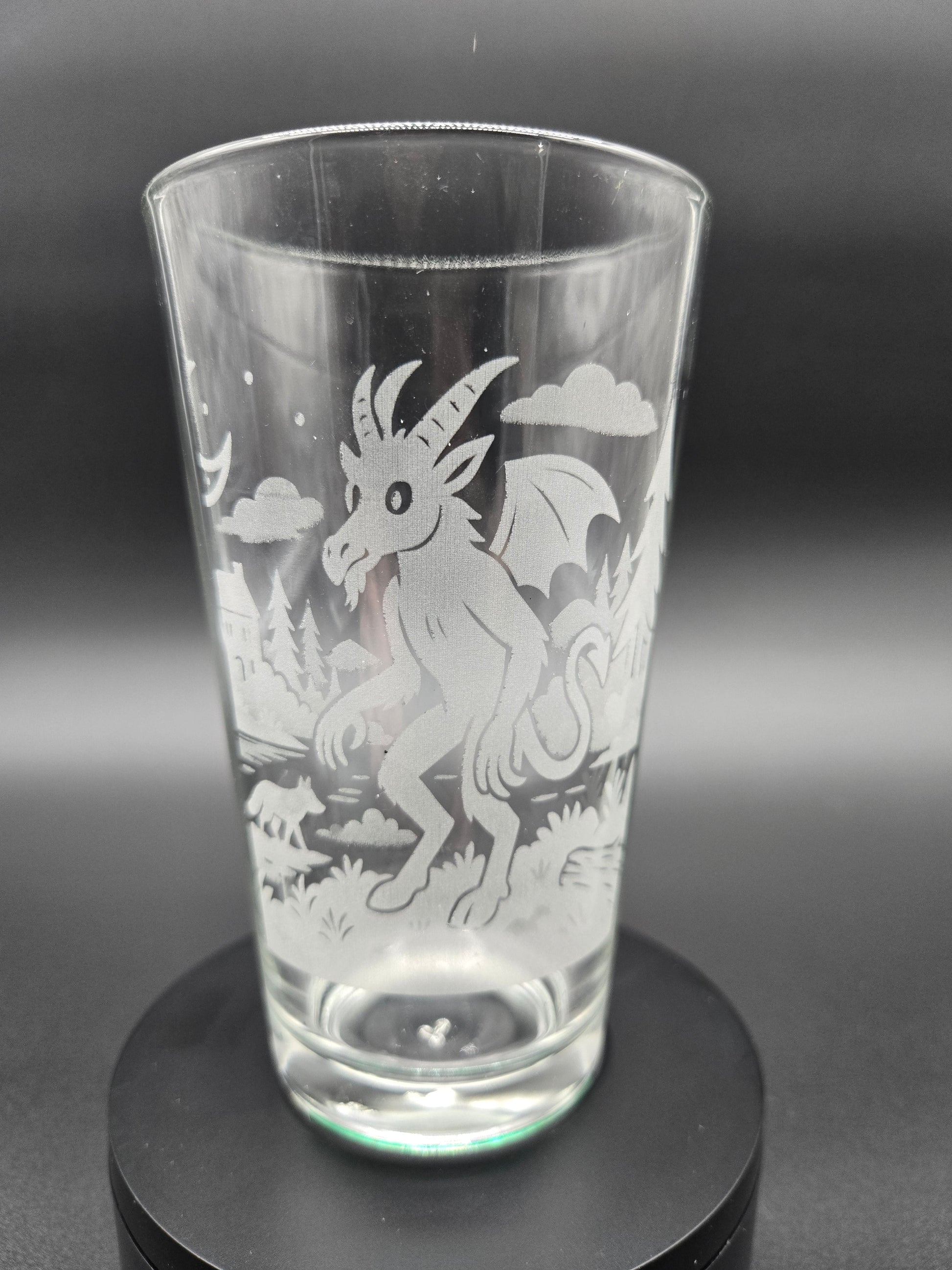 Engraved bar glass featuring Jersey Devil cryptid design by Frozen Forge