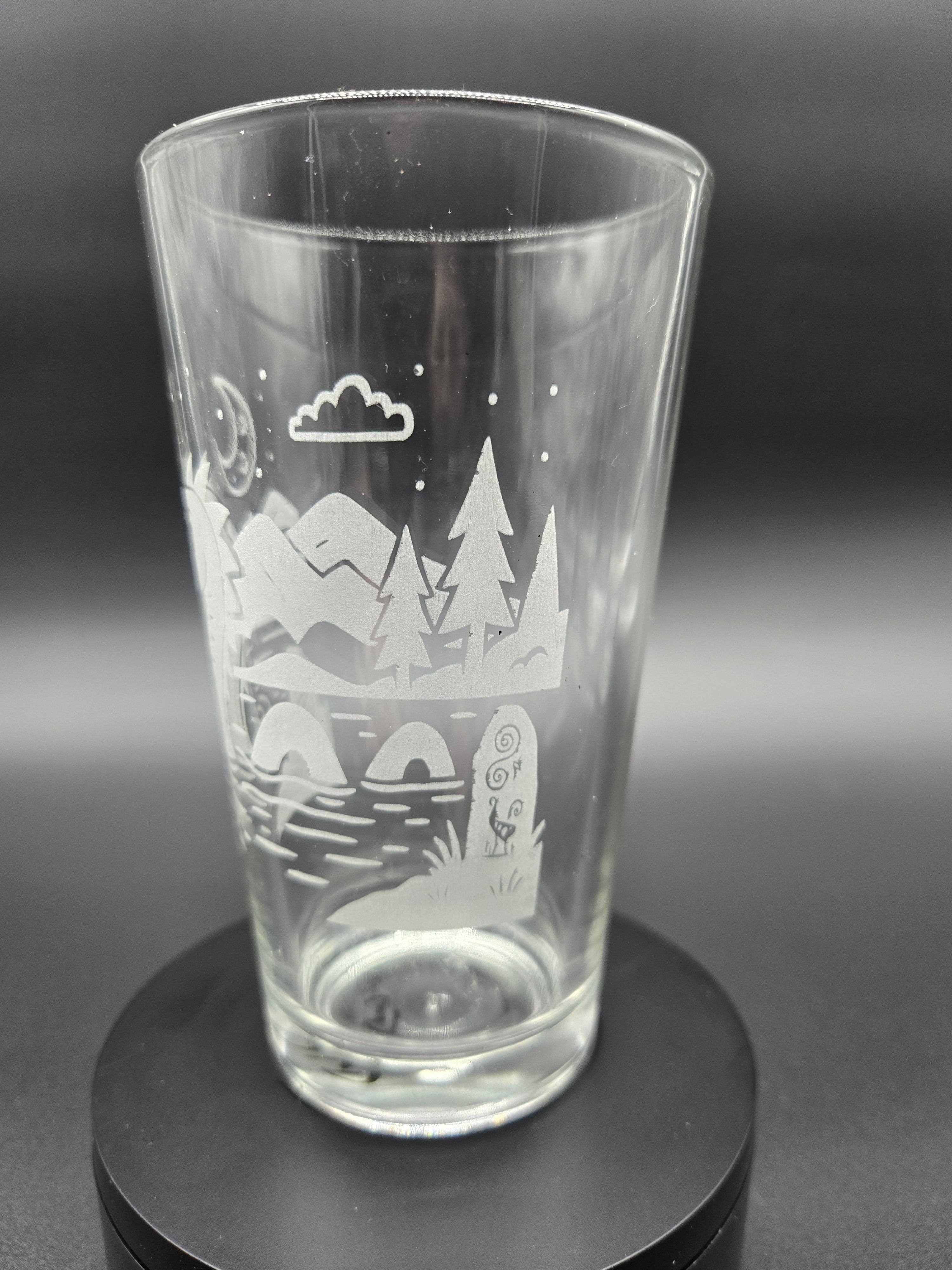 Engraved bar glass with Loch Ness Monster cryptid design by Frozen Forge