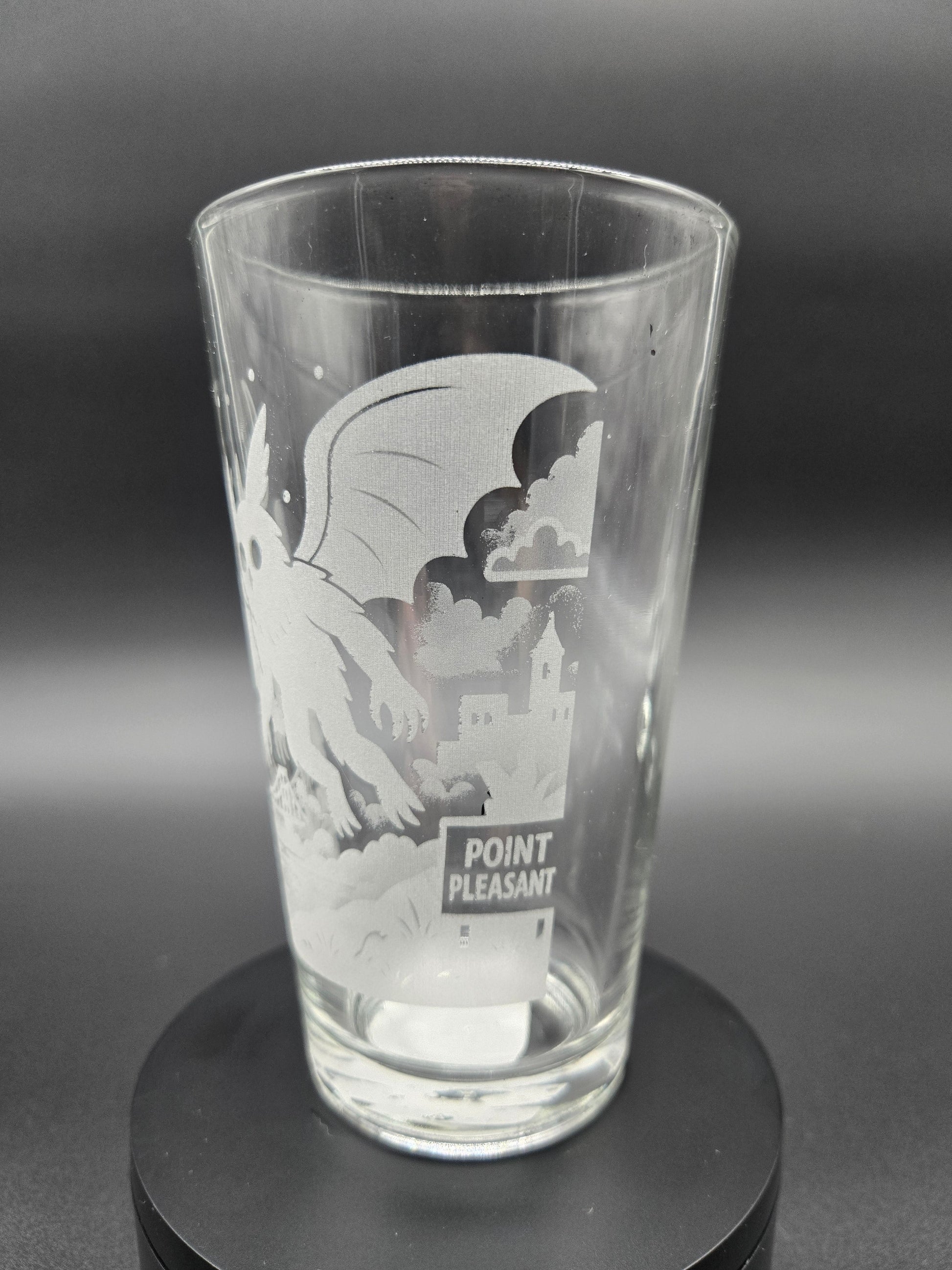Engraved bar glass with Mothman cryptid design by Frozen Forge