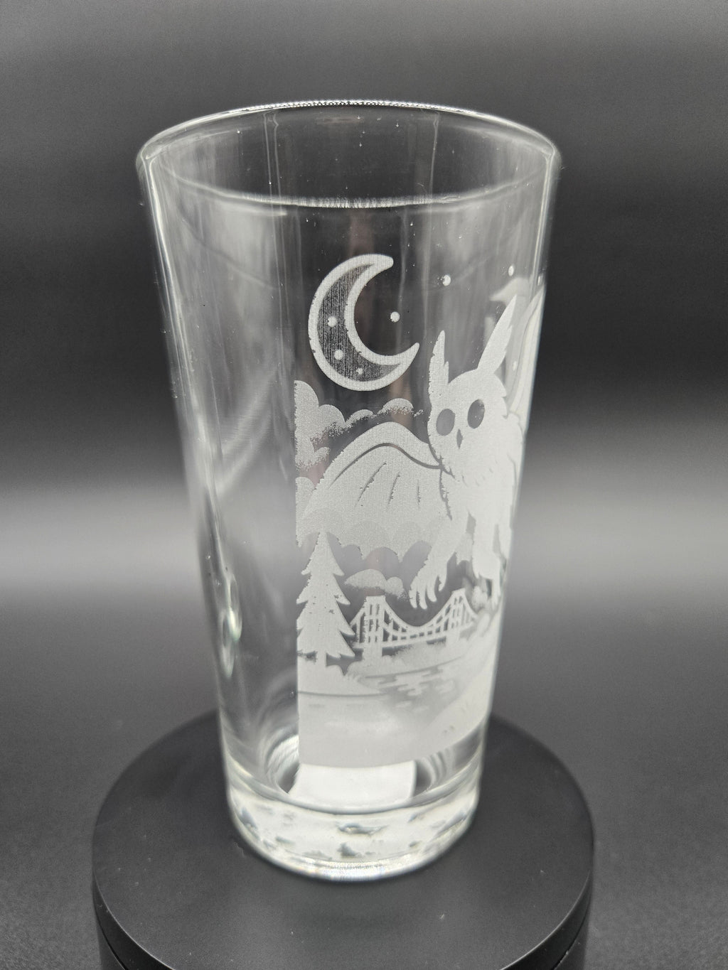 Engraved bar glass with Mothman cryptid design by Frozen Forge