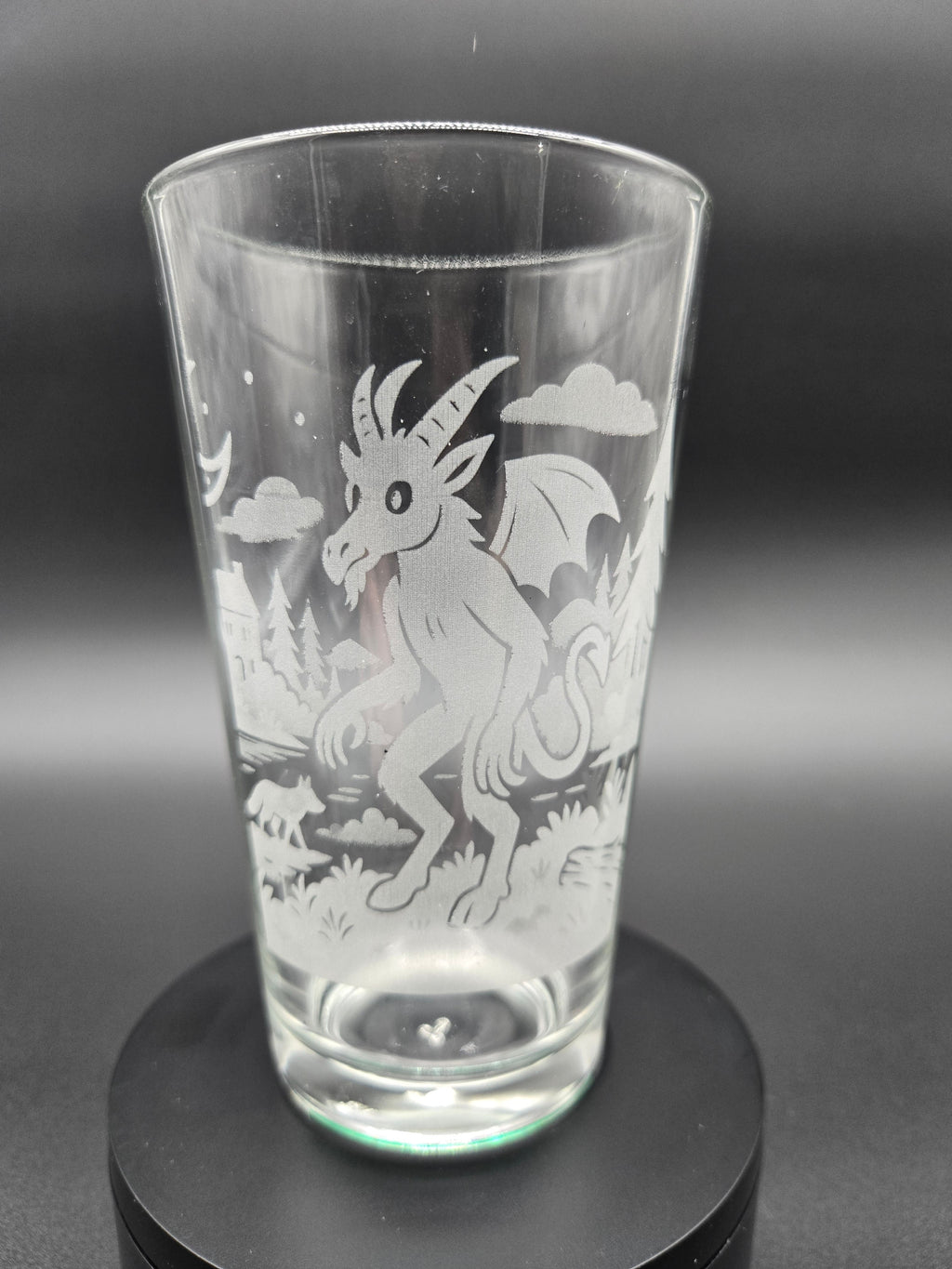 Engraved bar glass featuring Jersey Devil cryptid design by Frozen Forge