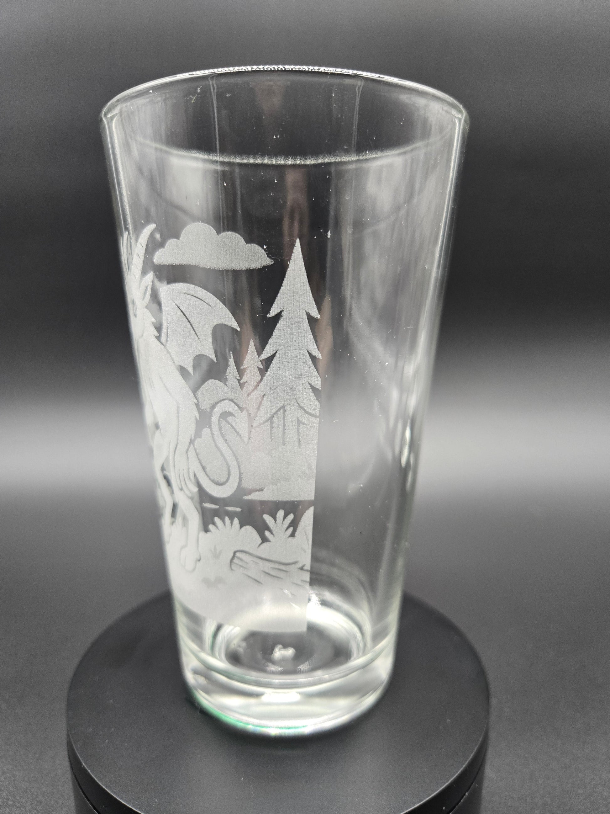 Engraved bar glass featuring Jersey Devil cryptid design by Frozen Forge
