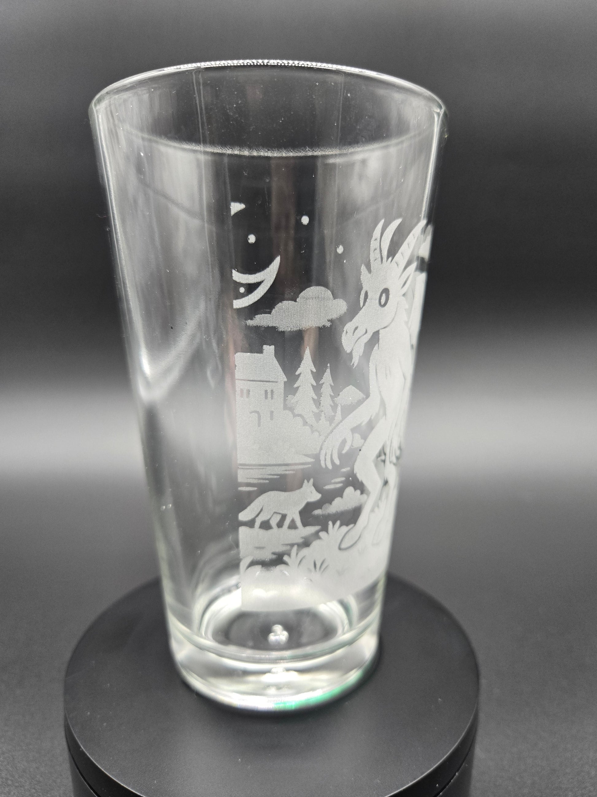 Engraved bar glass featuring Jersey Devil cryptid design by Frozen Forge