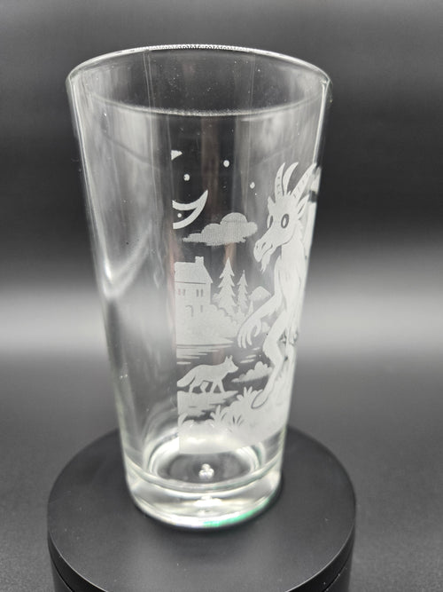 Engraved bar glass featuring Jersey Devil cryptid design by Frozen Forge