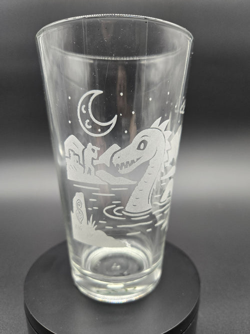 Engraved bar glass with Loch Ness Monster cryptid design by Frozen Forge

