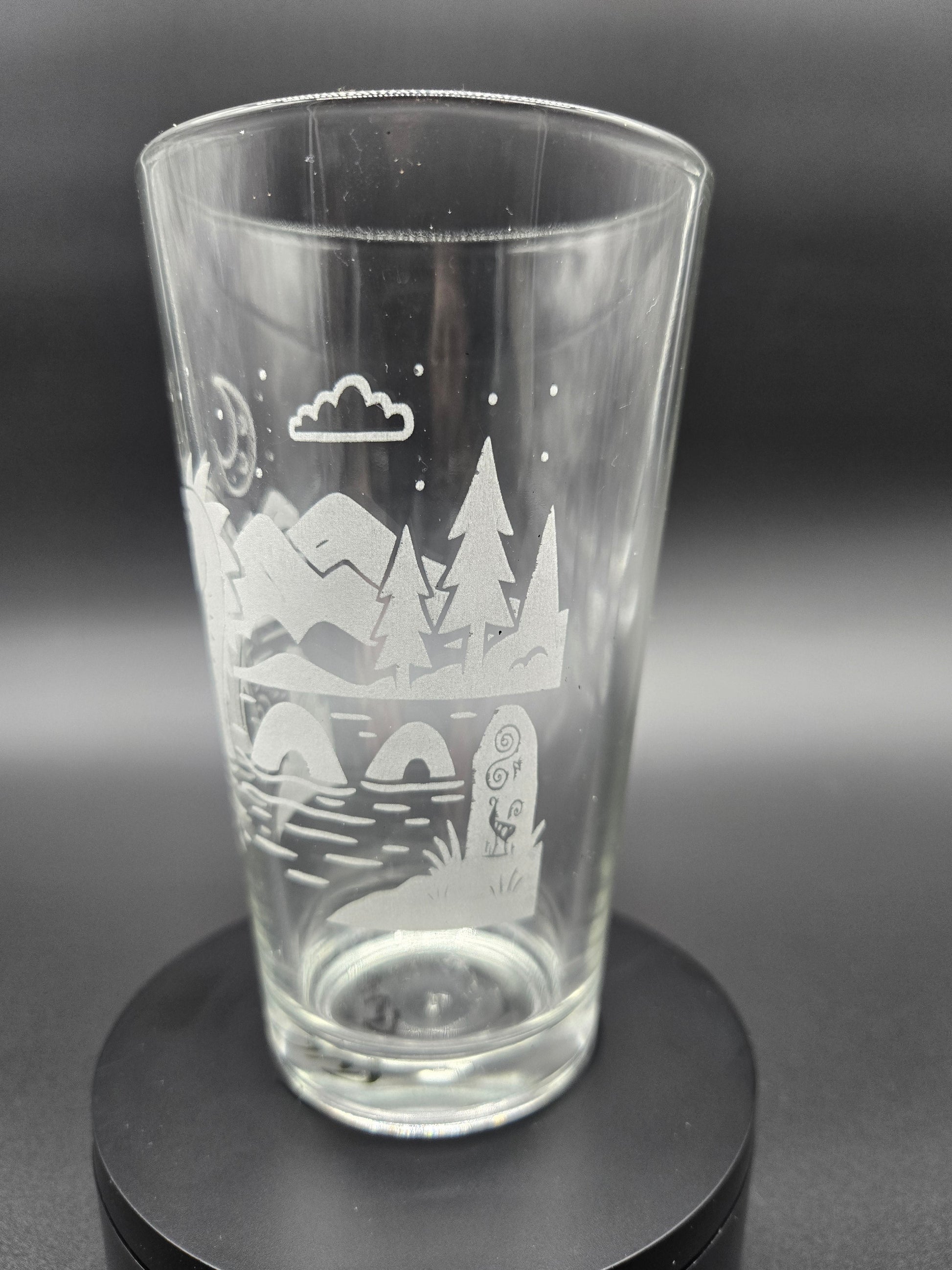 Engraved bar glass with Loch Ness Monster cryptid design by Frozen Forge