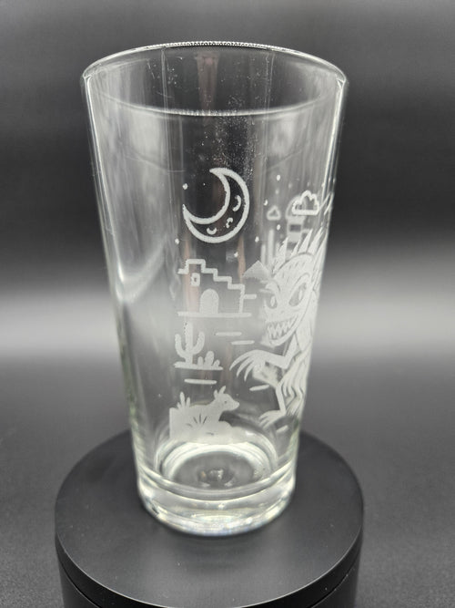 Engraved bar glass with Chupacabra cryptid design by Frozen Forge